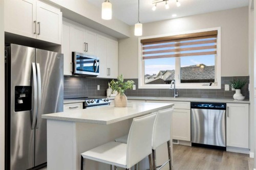 1021 Mahogany Boulevard Se, Calgary, AB - Indoor Photo Showing Kitchen With Upgraded Kitchen