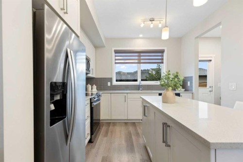 1021 Mahogany Boulevard Se, Calgary, AB - Indoor Photo Showing Kitchen With Upgraded Kitchen