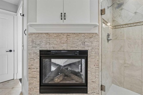 3922 16A Street Sw, Calgary, AB - Indoor Photo Showing Living Room With Fireplace