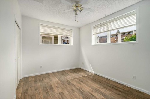 2-116 First Street, Cochrane, AB - Indoor Photo Showing Other Room