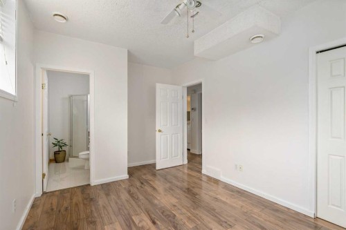 2-116 First Street, Cochrane, AB - Indoor Photo Showing Other Room