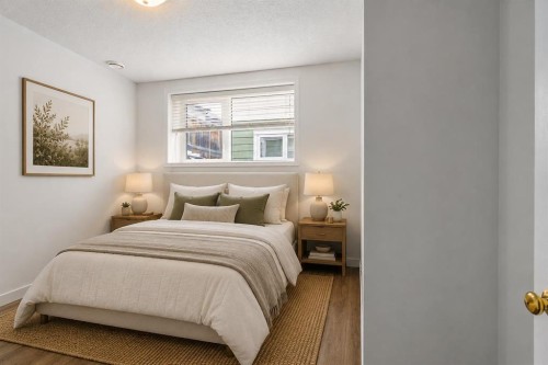 2-116 First Street, Cochrane, AB - Indoor Photo Showing Bedroom