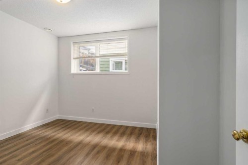 2-116 First Street, Cochrane, AB - Indoor Photo Showing Other Room