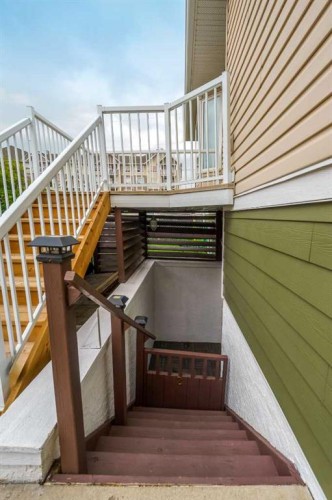 2-116 First Street, Cochrane, AB - Outdoor With Exterior