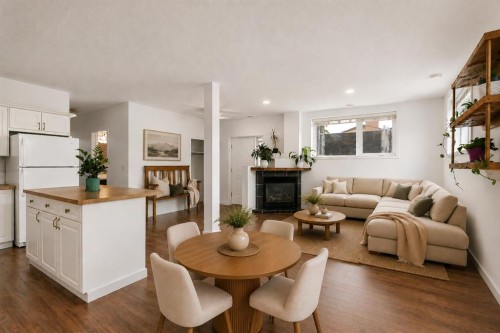 2-116 First Street, Cochrane, AB - Indoor With Fireplace