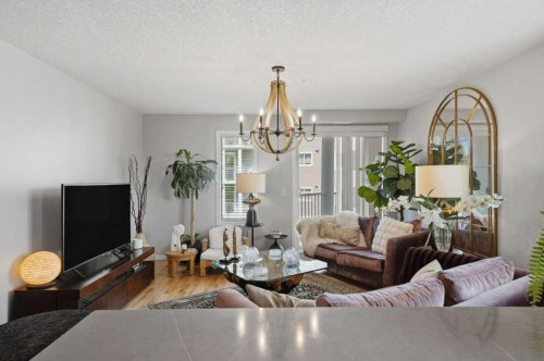 3301-10 Country Village Park Ne, Calgary, AB - Indoor Photo Showing Living Room