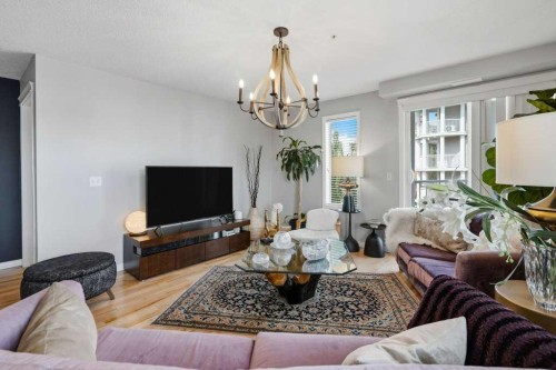 3301-10 Country Village Park Ne, Calgary, AB - Indoor Photo Showing Living Room