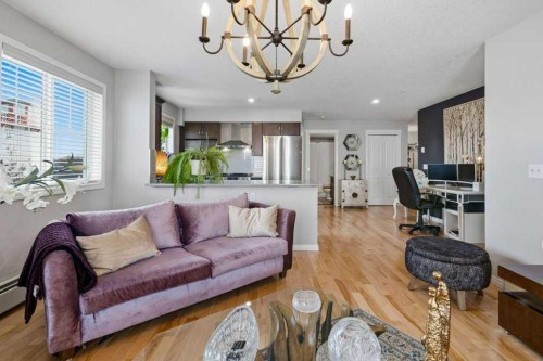 3301-10 Country Village Park Ne, Calgary, AB - Indoor Photo Showing Living Room