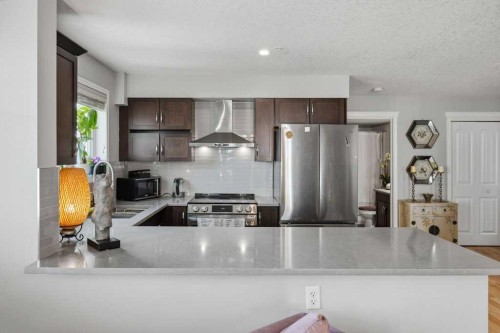 3301-10 Country Village Park Ne, Calgary, AB - Indoor Photo Showing Kitchen With Double Sink With Upgraded Kitchen