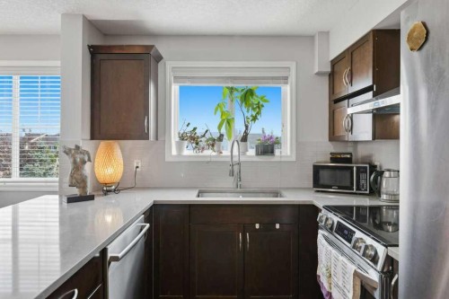 3301-10 Country Village Park Ne, Calgary, AB - Indoor Photo Showing Kitchen