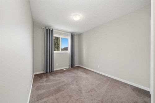 75 Legacy Glen Row Se, Calgary, AB - Indoor Photo Showing Other Room