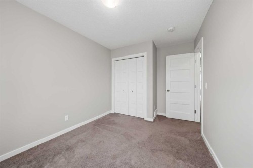 75 Legacy Glen Row Se, Calgary, AB - Indoor Photo Showing Other Room