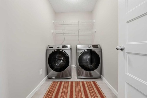 75 Legacy Glen Row Se, Calgary, AB - Indoor Photo Showing Laundry Room