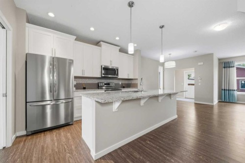75 Legacy Glen Row Se, Calgary, AB - Indoor Photo Showing Kitchen With Stainless Steel Kitchen With Upgraded Kitchen