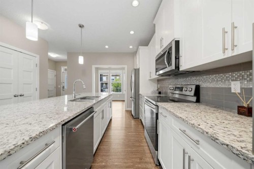 75 Legacy Glen Row Se, Calgary, AB - Indoor Photo Showing Kitchen With Stainless Steel Kitchen With Upgraded Kitchen