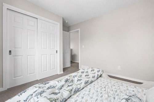 260 Carringham Way Nw, Calgary, AB - Indoor Photo Showing Bedroom
