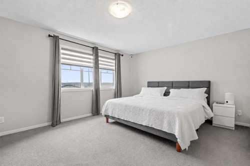 260 Carringham Way Nw, Calgary, AB - Indoor Photo Showing Bedroom