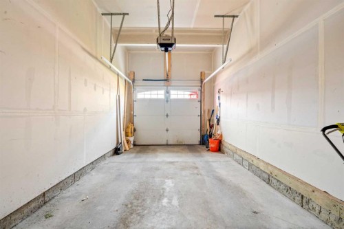 260 Carringham Way Nw, Calgary, AB - Indoor Photo Showing Garage