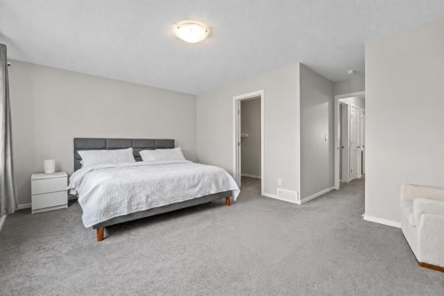 260 Carringham Way Nw, Calgary, AB - Indoor Photo Showing Bedroom