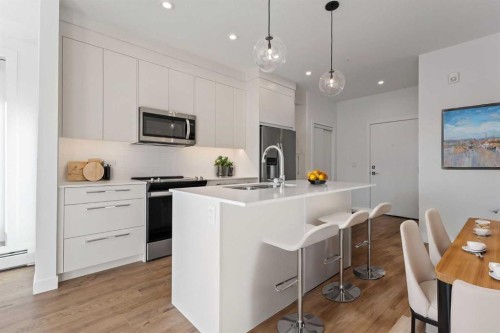 2418-395 Skyview Parkway Ne, Calgary, AB - Indoor Photo Showing Kitchen With Upgraded Kitchen