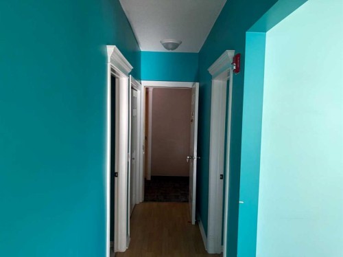 101-7 Lineham Avenue, Okotoks, AB - Indoor Photo Showing Other Room