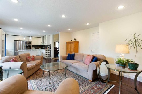 24 Sun Harbour Place Se, Calgary, AB - Indoor Photo Showing Living Room