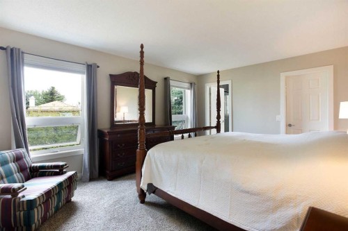 24 Sun Harbour Place Se, Calgary, AB - Indoor Photo Showing Bedroom