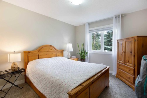 24 Sun Harbour Place Se, Calgary, AB - Indoor Photo Showing Bedroom
