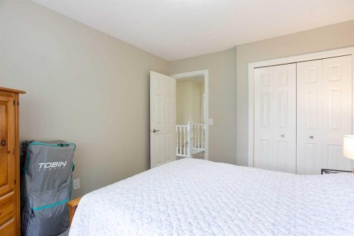 24 Sun Harbour Place Se, Calgary, AB - Indoor Photo Showing Bedroom