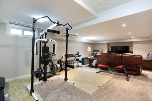 24 Sun Harbour Place Se, Calgary, AB - Indoor Photo Showing Gym Room