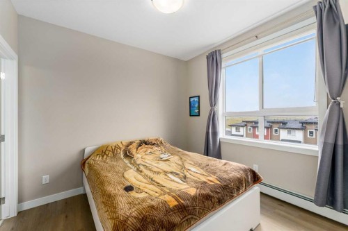 410-35 Walgrove Walk Se, Calgary, AB - Indoor Photo Showing Bedroom