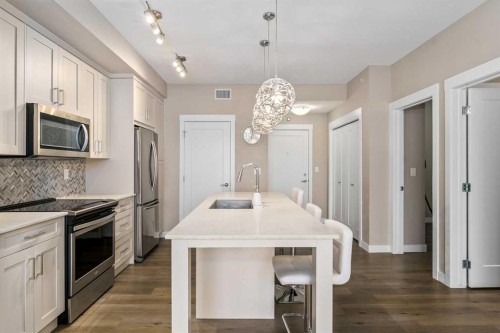 410-35 Walgrove Walk Se, Calgary, AB - Indoor Photo Showing Kitchen With Stainless Steel Kitchen With Upgraded Kitchen