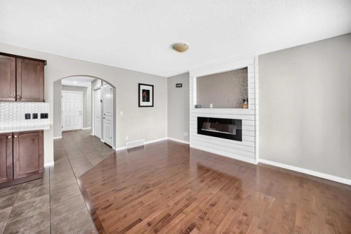 195 Taralake Way, Calgary, AB - Indoor With Fireplace