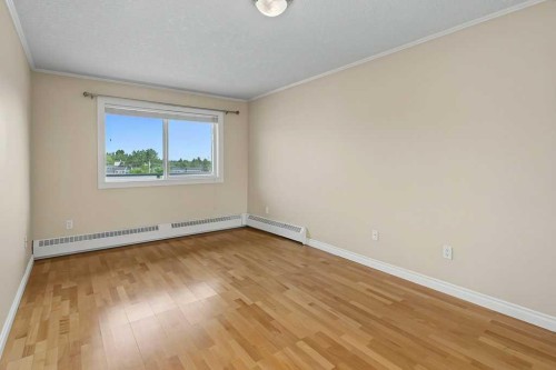 414-333 Garry Crescent Ne, Calgary, AB - Indoor Photo Showing Other Room