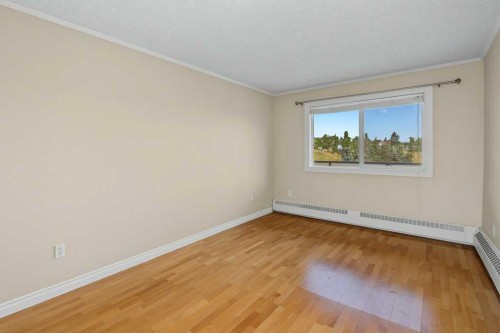 414-333 Garry Crescent Ne, Calgary, AB - Indoor Photo Showing Other Room