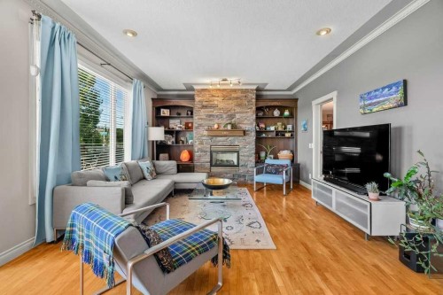 40 Sienna Park Crescent Sw, Calgary, AB - Indoor Photo Showing Living Room With Fireplace