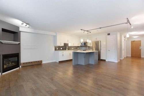 239-8535 Bonaventure Drive Se, Calgary, AB - Indoor With Fireplace
