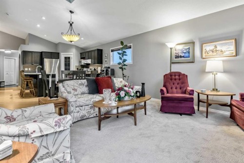 416 Silverado Range Heights Sw, Calgary, AB - Indoor Photo Showing Living Room