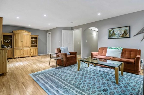 416 Silverado Range Heights Sw, Calgary, AB - Indoor Photo Showing Living Room