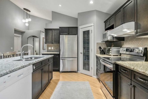 416 Silverado Range Heights Sw, Calgary, AB - Indoor Photo Showing Kitchen With Stainless Steel Kitchen With Double Sink With Upgraded Kitchen