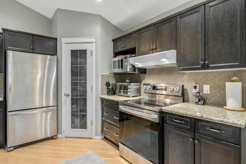 416 Silverado Range Heights Sw, Calgary, AB - Indoor Photo Showing Kitchen