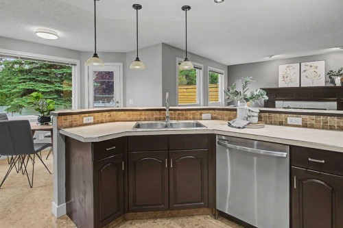 61 Wood Valley Road Sw, Calgary, AB - Indoor Photo Showing Kitchen With Double Sink