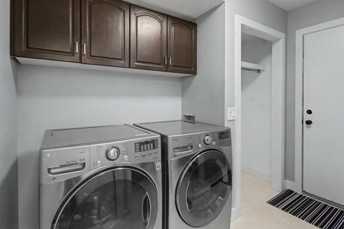 61 Wood Valley Road Sw, Calgary, AB - Indoor Photo Showing Laundry Room
