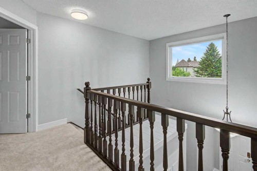61 Wood Valley Road Sw, Calgary, AB - Indoor Photo Showing Other Room