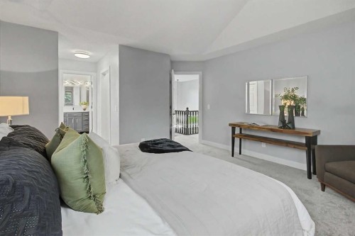 61 Wood Valley Road Sw, Calgary, AB - Indoor Photo Showing Bedroom