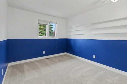 61 Wood Valley Road Sw, Calgary, AB - Indoor Photo Showing Other Room
