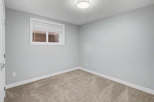 61 Wood Valley Road Sw, Calgary, AB - Indoor Photo Showing Other Room