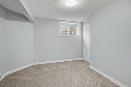 61 Wood Valley Road Sw, Calgary, AB - Indoor Photo Showing Other Room