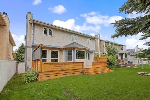 61 Wood Valley Road Sw, Calgary, AB - Outdoor With Deck Patio Veranda