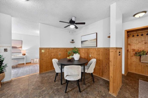 1837 Meadowbrook Drive Se, Airdrie, AB - Indoor Photo Showing Dining Room